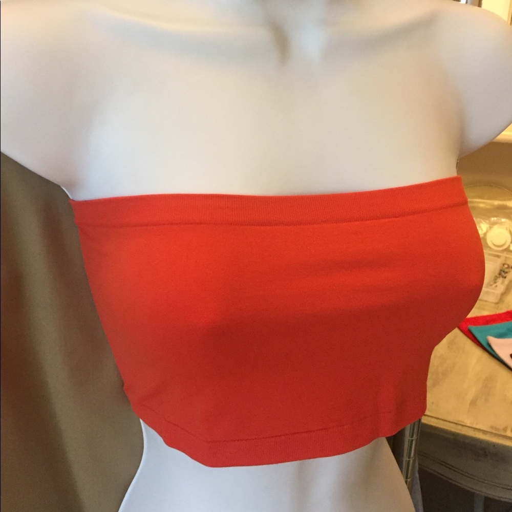 Halter tops in multiple Colors. Never worn.